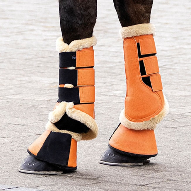 Guêtres de dressage doublées mouton synthétique pour poneys et chevaux HKM Comfort Premium orange