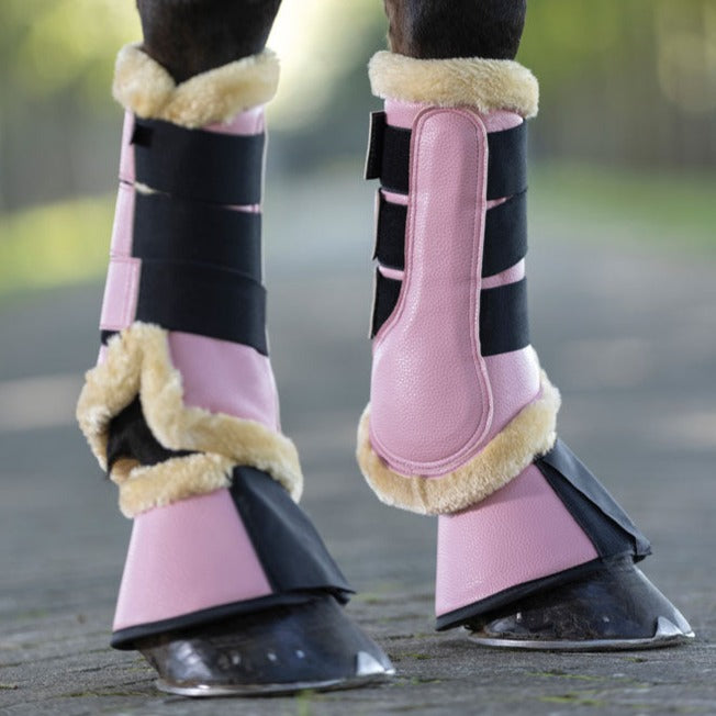 Guêtres de dressage doublées mouton synthétique pour poneys et chevaux HKM Comfort Premium rose