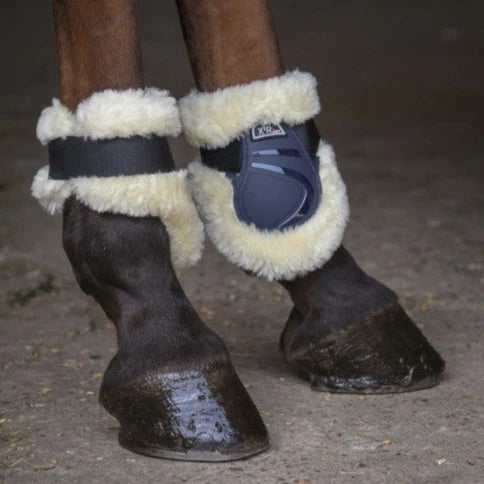 Protège-boulets doublés mouton synthétique pour poneys et chevaux Norton XTR marine