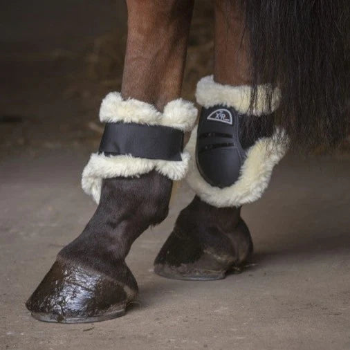 Protège-boulets doublés mouton synthétique pour poneys et chevaux Norton XTR noir
