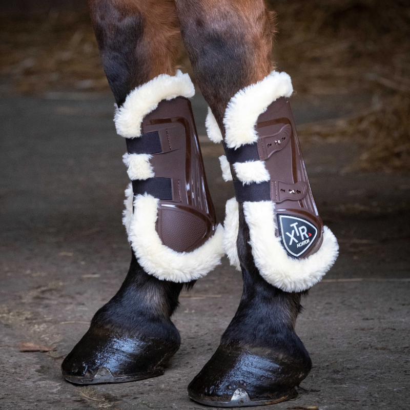 Protège-tendons doublés de mouton synthétique Norton XTR à boutons