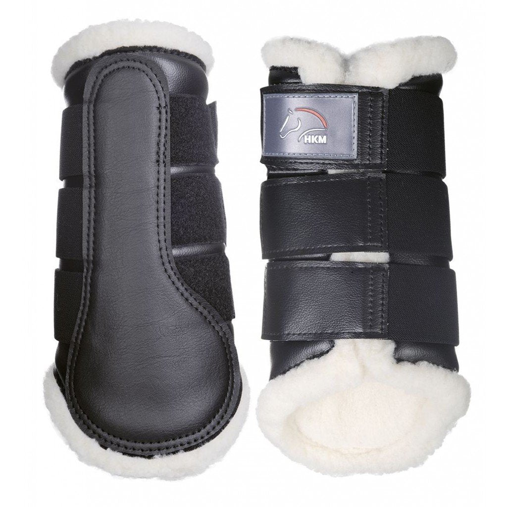 Guêtres de dressage pour poneys et chevaux HKM Comfort noir et mouton synthétique blanc