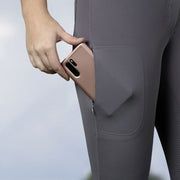 Pantalon d'équitation full grip pour cavalière HKM Della Sera gris détail poche de téléphone zippée
